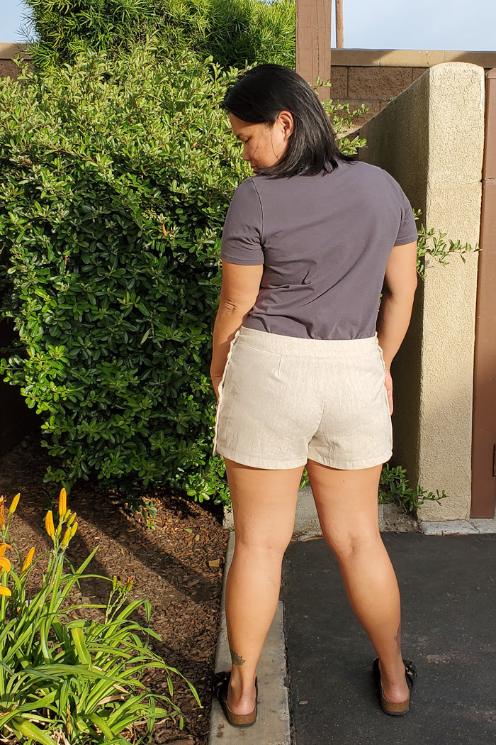 Woven shorts sewing pattern with side buttons by Blank Slate Patterns back view